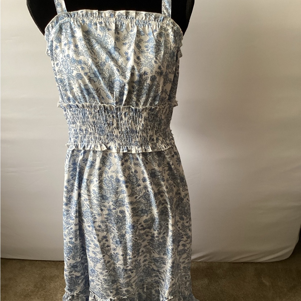 Indulge in style Blue Floral Smocked sun Dress
